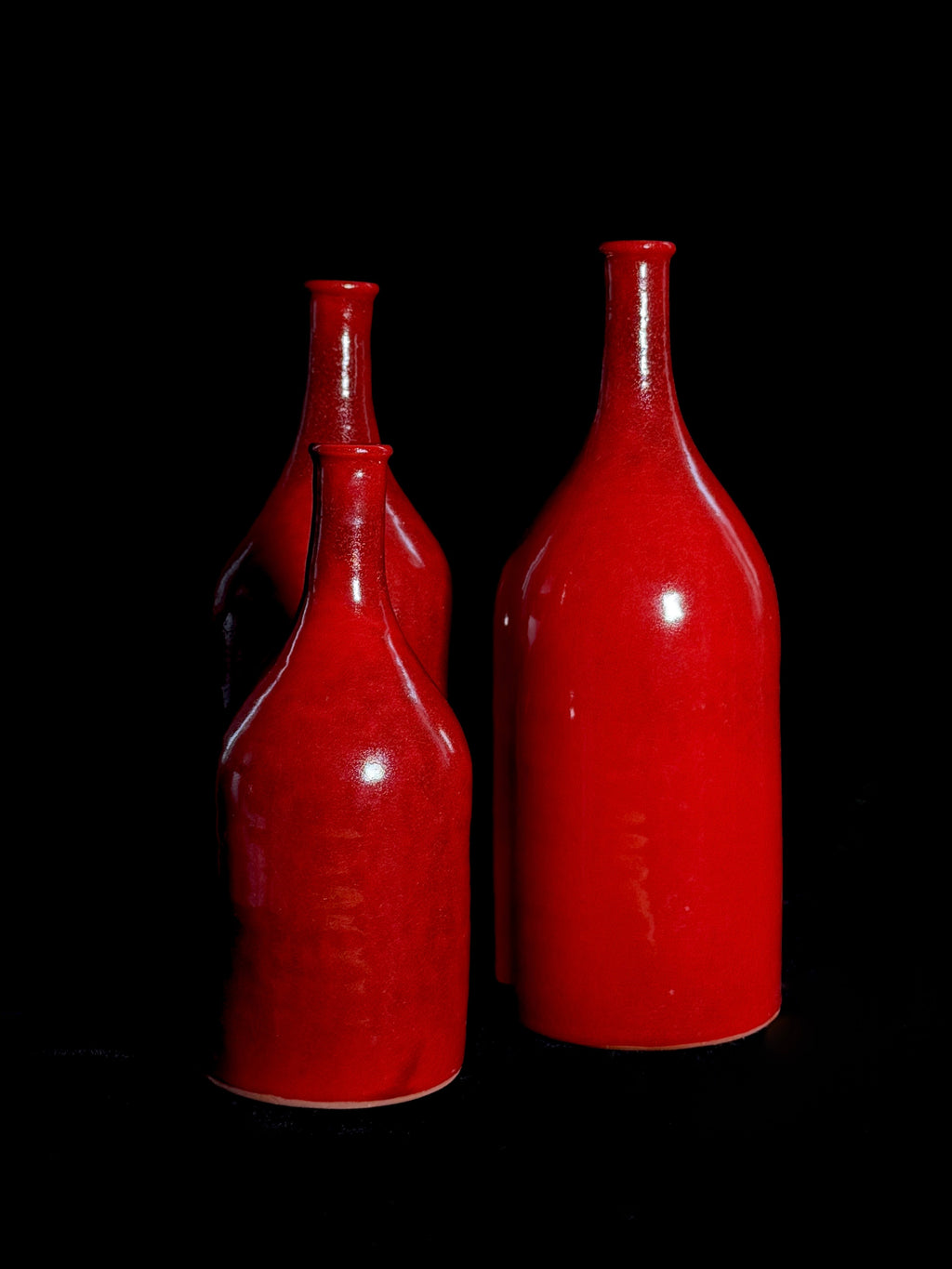 Bouteilles en poterie - Trio rouge vif